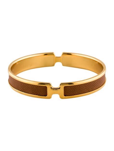 Olympe bracelet Hermès Gold in Gold plated .